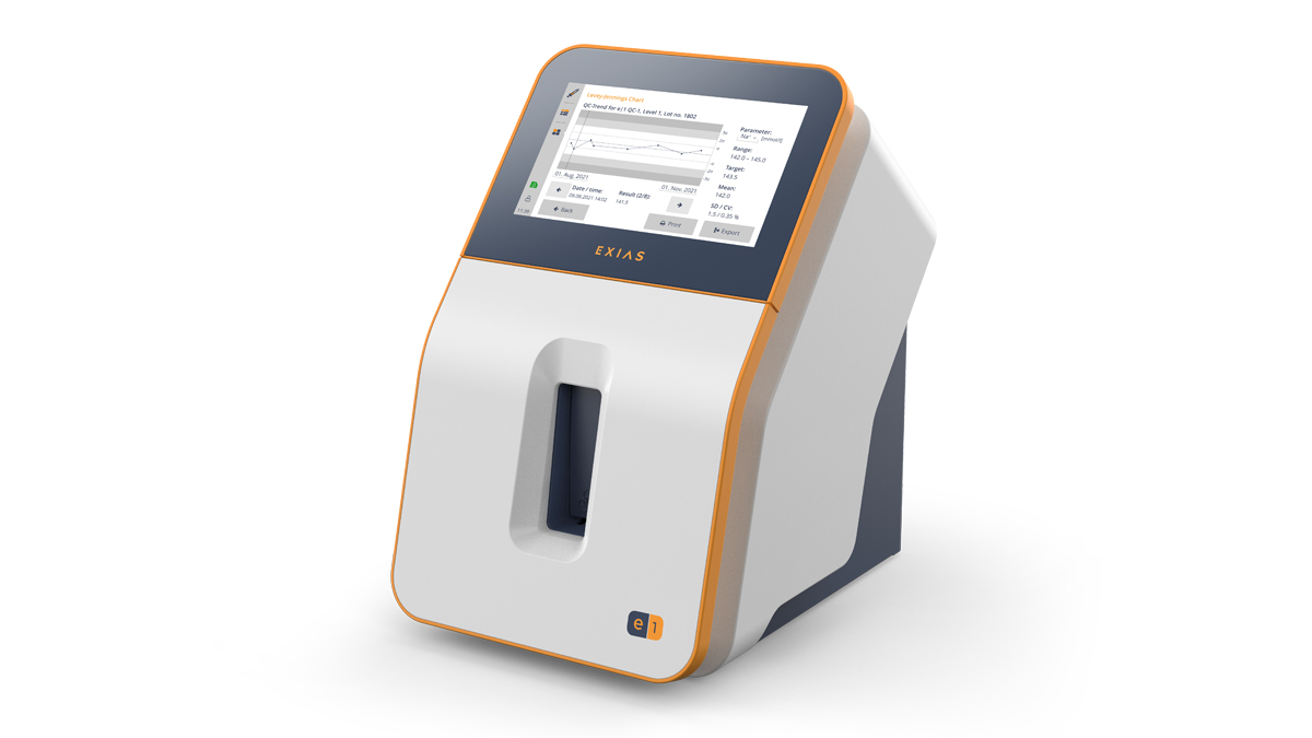 Et moderne medicinsk udstyr med en touchscreen-skærm, der viser diagrammer og data, mærket "EXIAS" på forsiden.